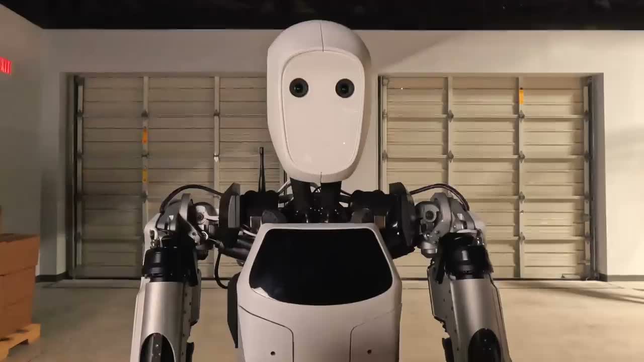 Apptronik Apollo humanoid robot facing the camera in a facility. Still from the official Apptronik video "Hello Apollo" (2023).