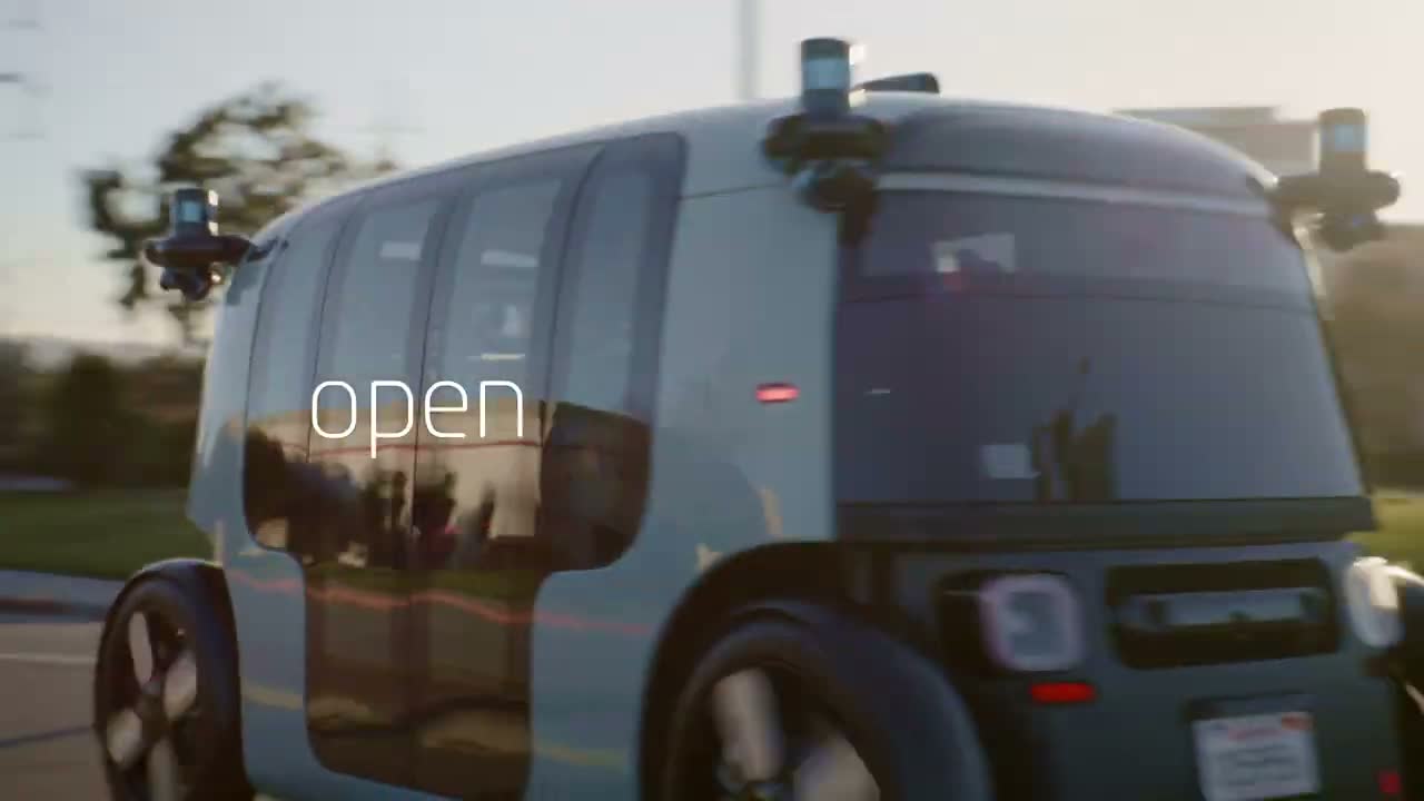 Zoox robotaxi driving on a public road. Still from the official Zoox video "The Zoox Robotaxi On Open Public Roads" (2023).